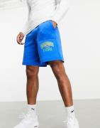 Puma x The Hundreds - Vendbare shorts med logo i blå og grøn