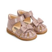 Starter sandals with a bow and velcro closure