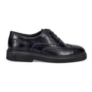 Raffinerede sorte flade sko