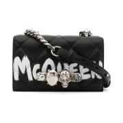 Alexander McQueen tasker .. sort