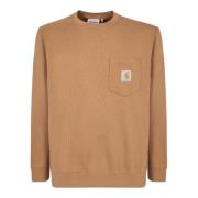 Sweatshirt with patch pocket detail by Carhartt. Minimal but functional design, an ideal must have for an everyday look