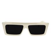 Glamourøse firkantede solbriller med minimalistisk elfenbensramme