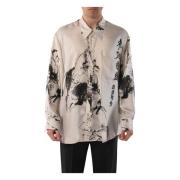 Silkeskjorte med trykt mønster og knapper