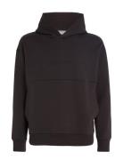 Comfort Debossed Logo Hoodie Tops Sweatshirts & Hoodies Hoodies Black Calvin Klein