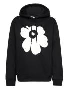 Runoja Unikko Placement Tops Sweatshirts & Hoodies Hoodies Black Marimekko