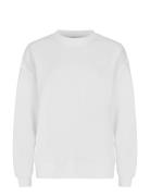 Iconic Sweatshirt Sport Sweatshirts & Hoodies Sweatshirts White Röhnisch