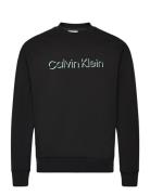 Shadow Embossed Logo Sweatshirt Tops Sweatshirts & Hoodies Sweatshirts Black Calvin Klein