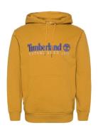 Established 1973 Embroidery Logo Brush Back Hoodie Chai Tea Tops Sweatshirts & Hoodies Hoodies Yellow Timberland