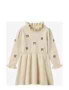 Benna Bow Dress Dresses & Skirts Dresses Casual Dresses Long-sleeved Casual Dresses Cream Fliink