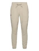 Ua Vibe Woven Jogger Sport Men Sport Clothing Sport Pants Sport Training Pants Beige Under Armour